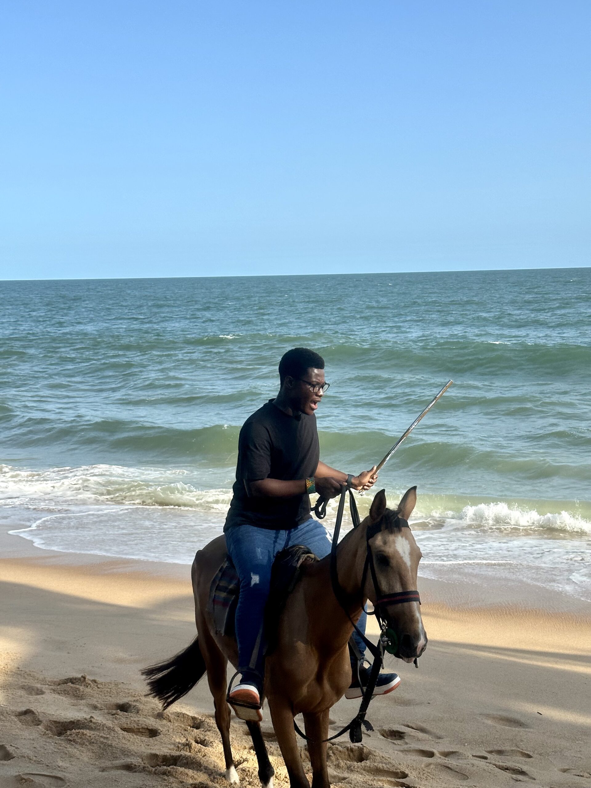 Okikiola, riding a Horse.